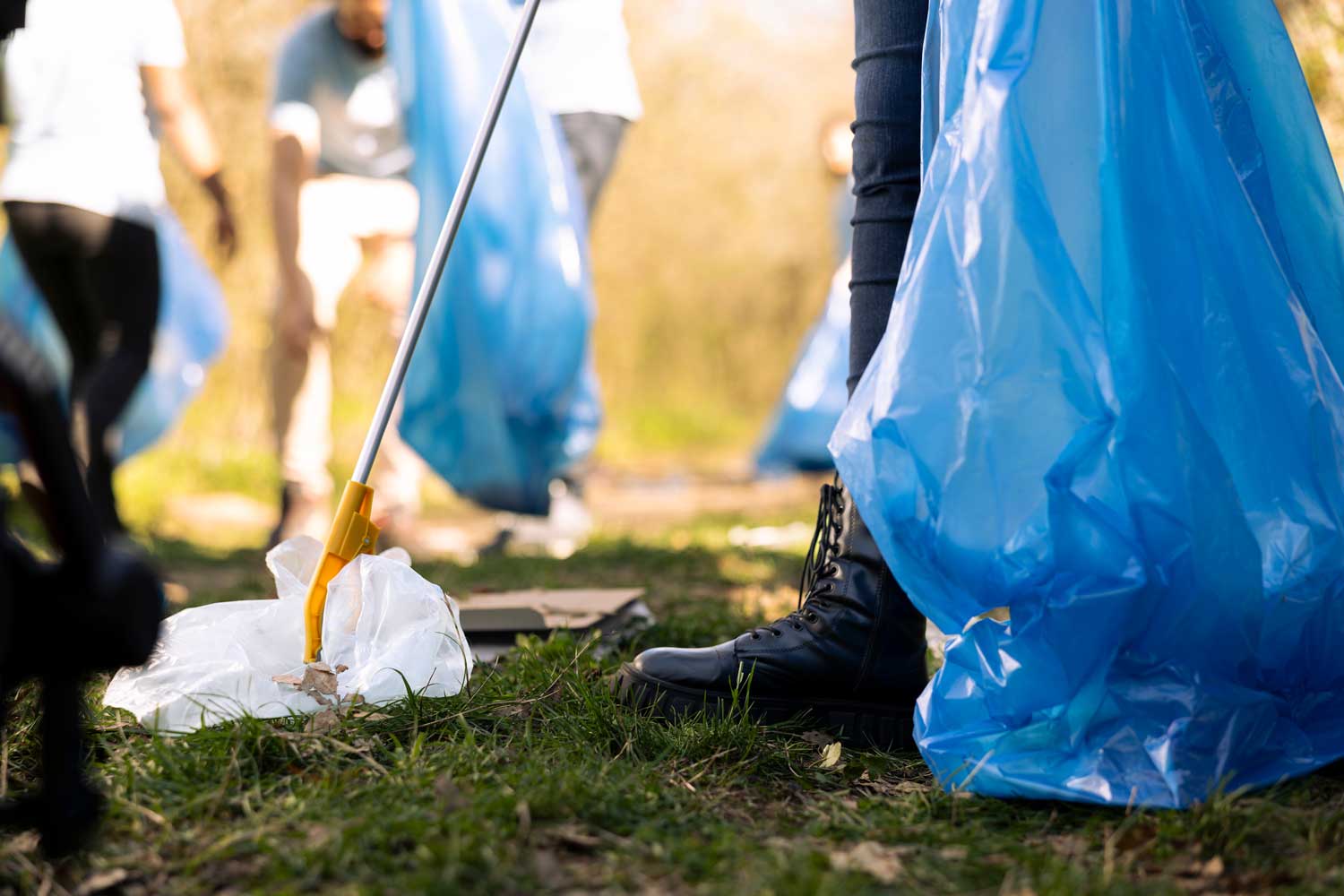 Crew clearing waste from a venue after an event
