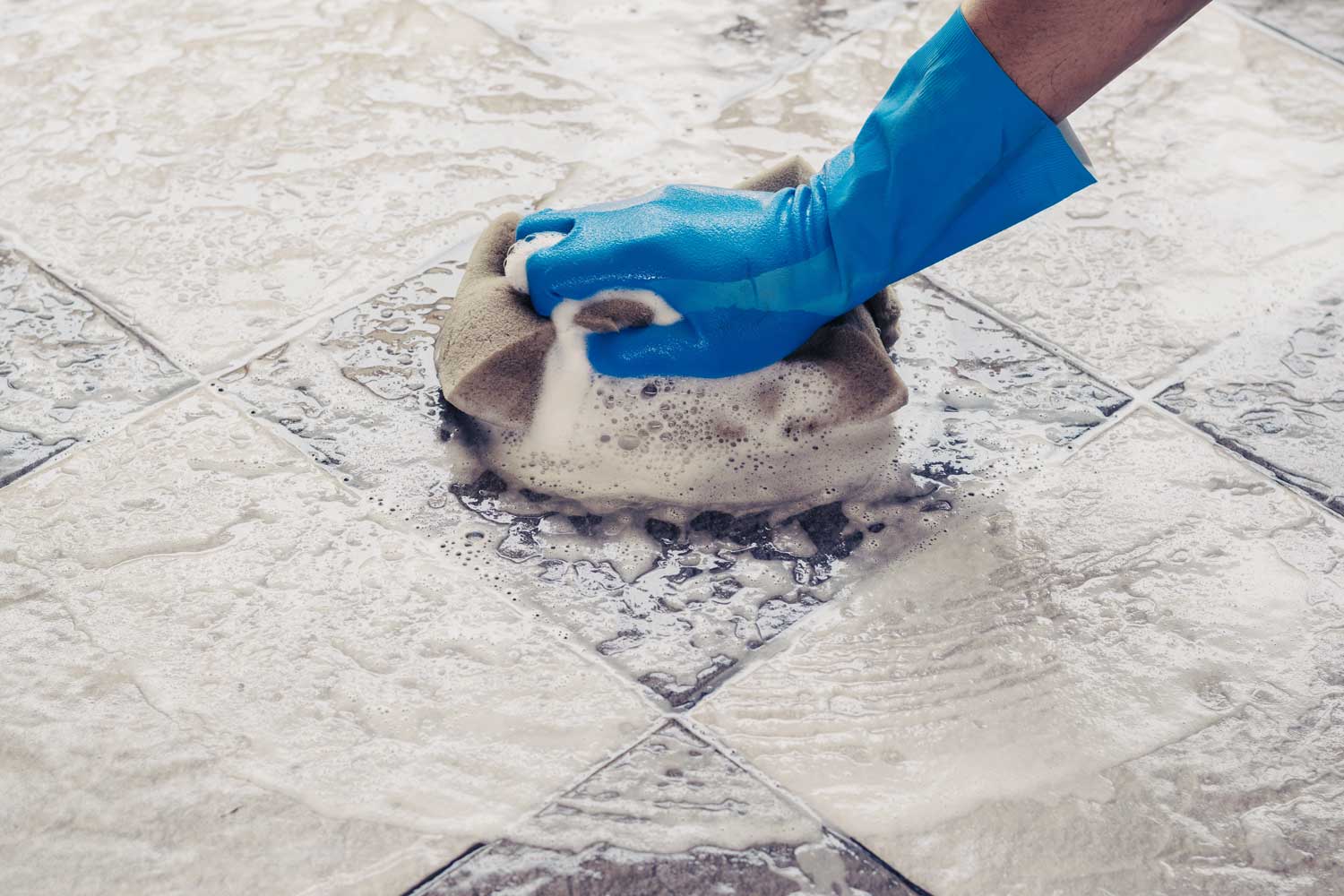 Floor being cleaned and finished after construction work