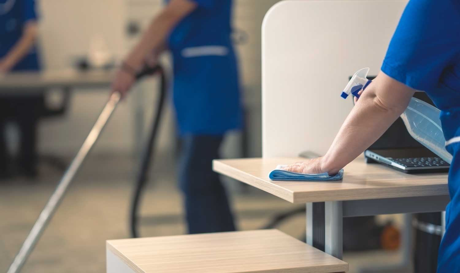 Janitorial cleaning cart and supplies in a facility corridor