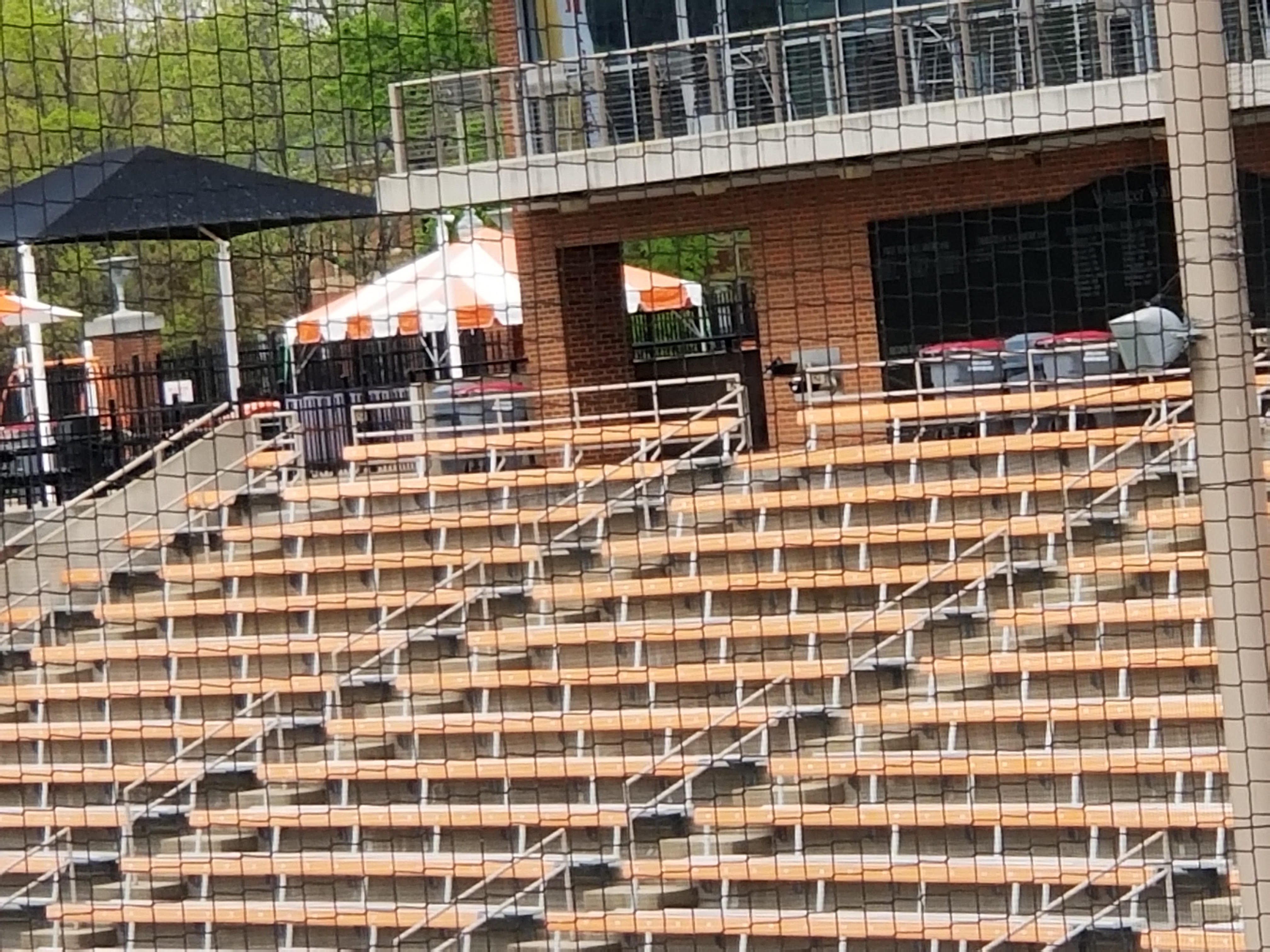 Stadium bleacher seating cleaned and reset ahead of an event